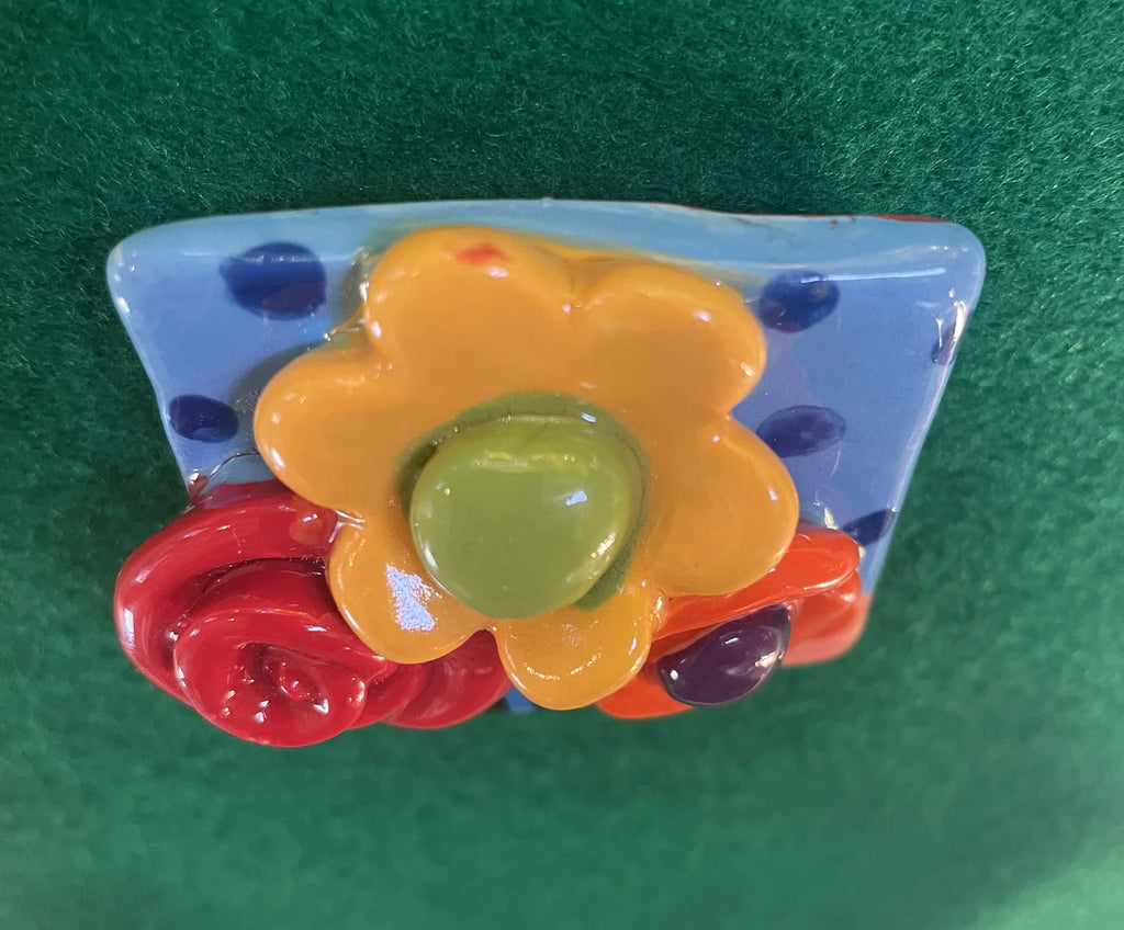 Brooch with Blue and Peach Background