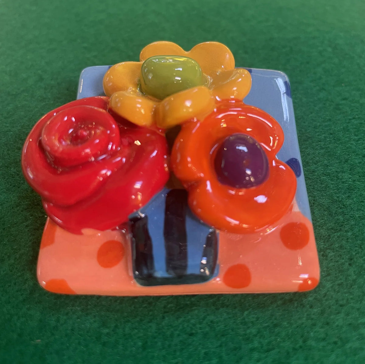 Brooch with Blue and Peach Background