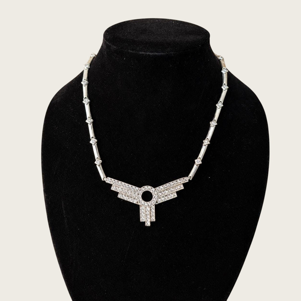 Belcaro Heirlooms vintage Art Deco revival silver-tone necklace with a geometric rhinestone fan pendant on display.