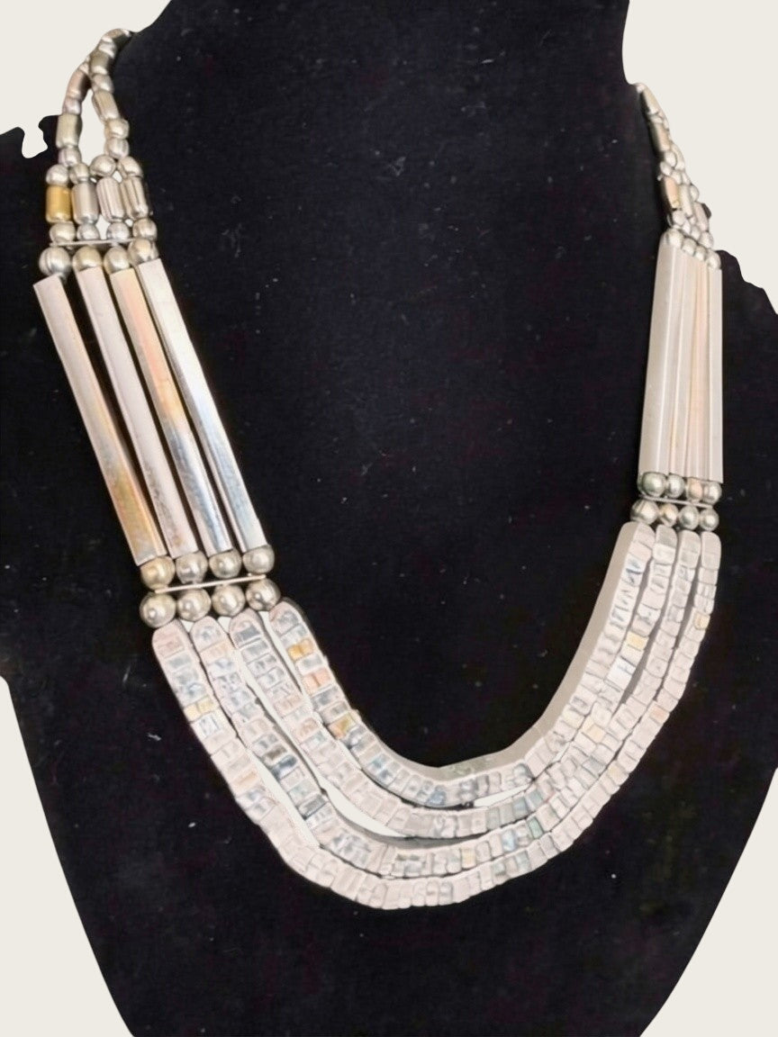 Belcaro Heirlooms vintage Egyptian revival silver-tone tribal bib necklace with multi-strand bead design.
