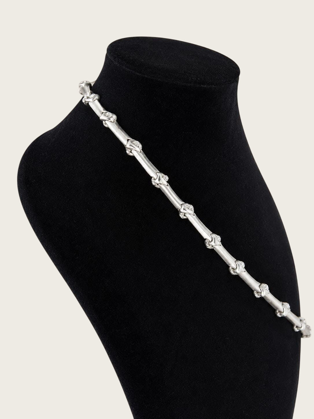 Belcaro Heirlooms vintage silver-tone chain necklace with rhinestone accents displayed on a black mannequin bust