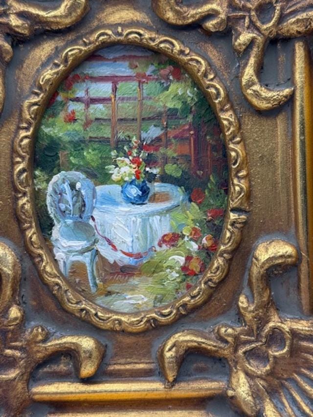 Miniature Garden Painting in ornate gold frame.