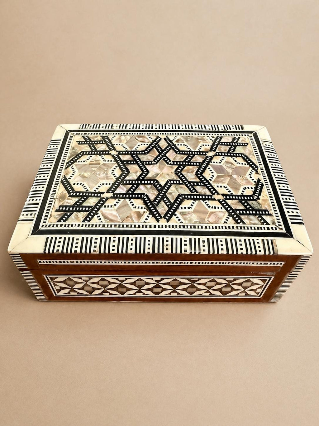 Inlaid Mother of Pearl box.
