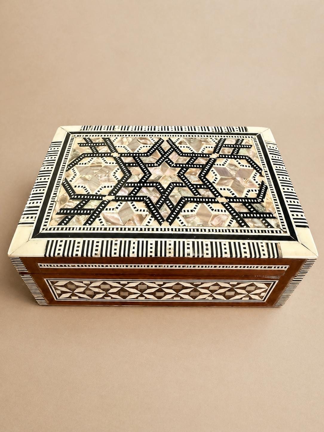 Inlaid Mother of Pearl box.