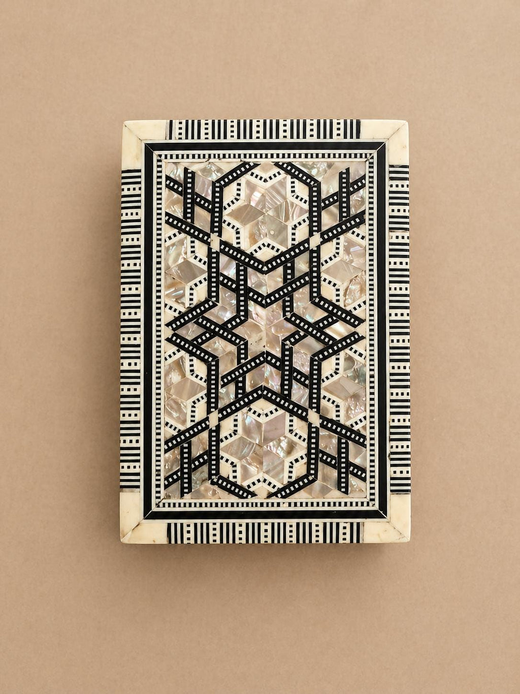 Inlaid Mother of Pearl box.