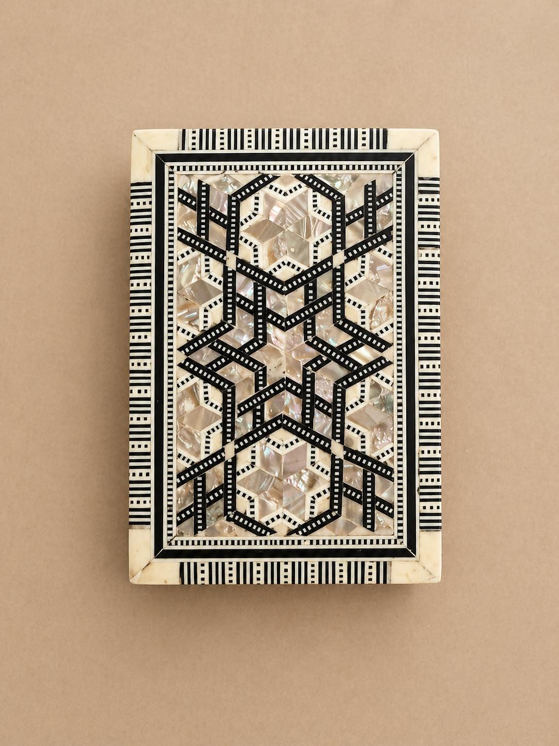Inlaid Mother of Pearl box.