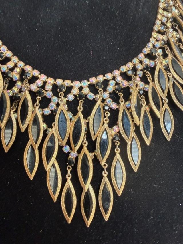 Gold-tone prong-set rhinestone / crystal necklace