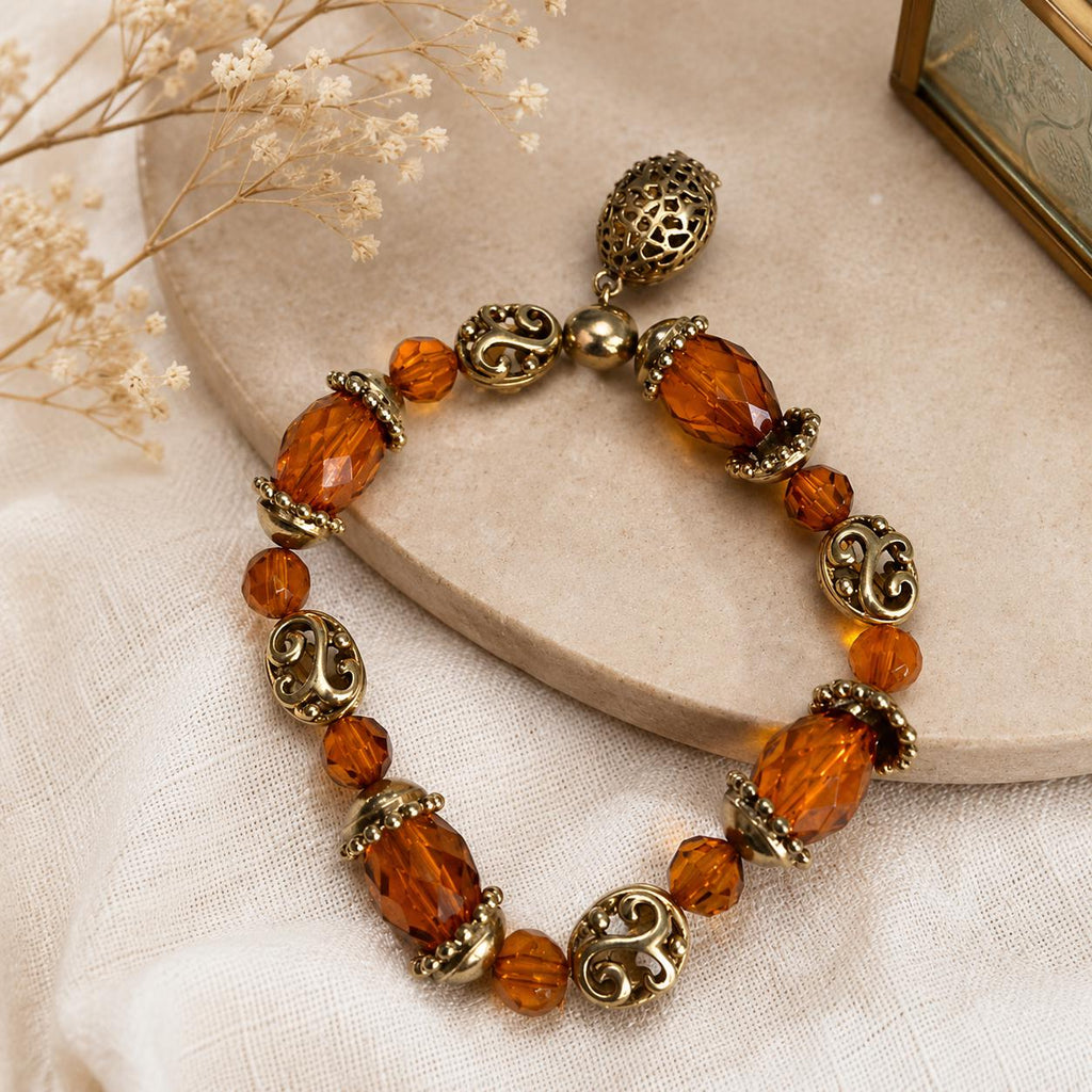 Vintage Amber Bead Stretch Bracelet With Gold Tone Filigree Charm Dangle