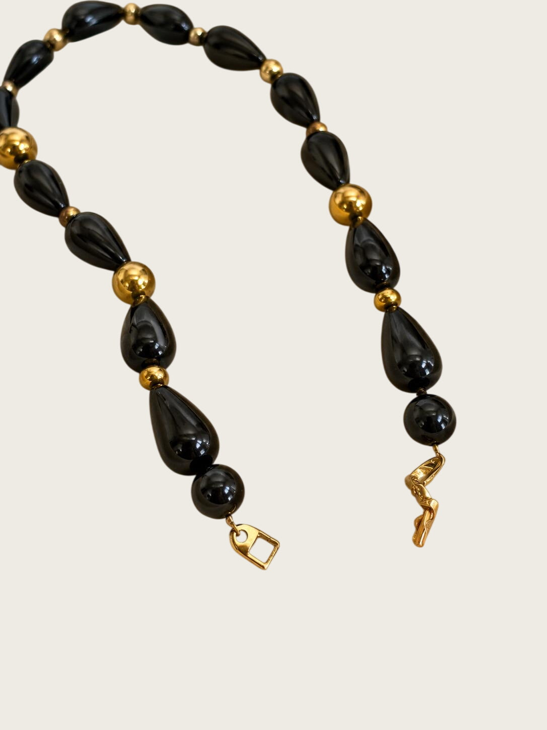 Vintage 1980s Napier Black Lucite Teardrop Gold Tone Bead Necklace 29 Inch