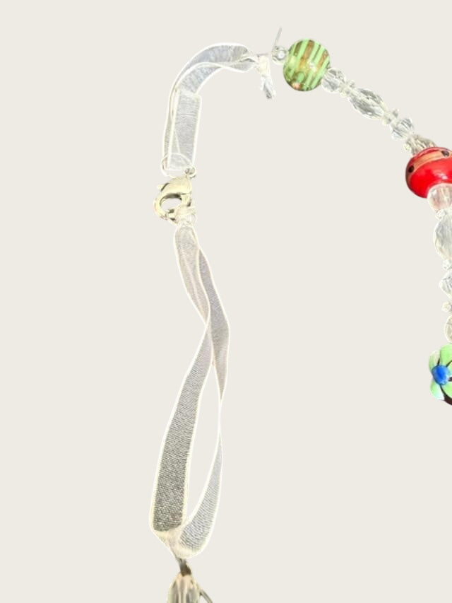 Extra-long multicolor lampwork-style glass bead necklace measuring approximately