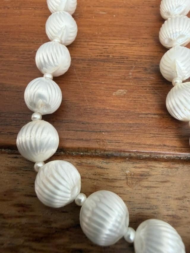 vintage long white carved plastic / acrylic bead necklace, approx. 55 inches