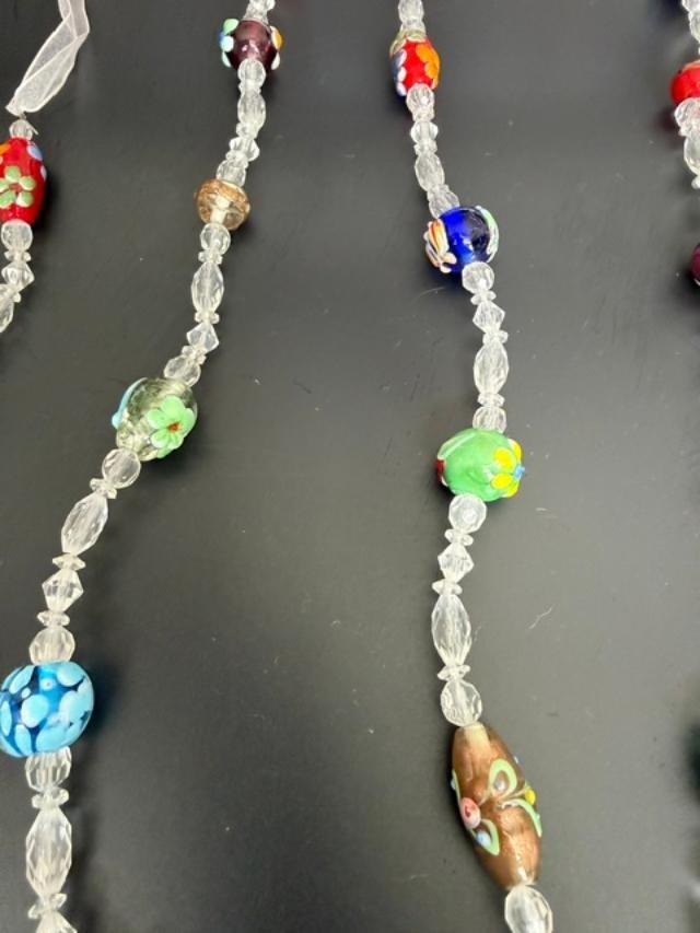 Extra-long multicolor lampwork-style glass bead necklace measuring approximately