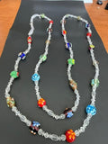 Extra-long multicolor lampwork-style glass bead necklace measuring approximately