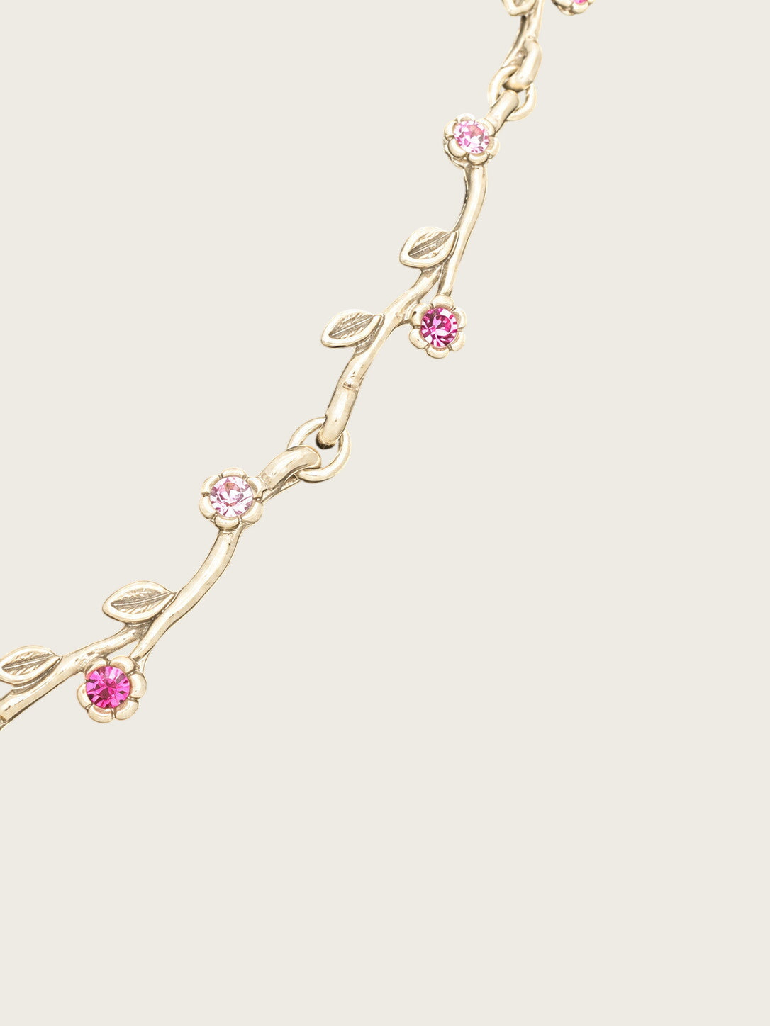 Openwork butterfly centerpiece with a pink rhinestone center