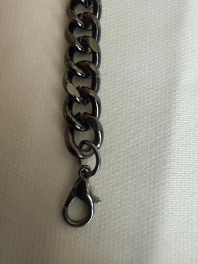 Gunmetal-tone curb-chain bracelet featuring a large rectangular faceted smoky