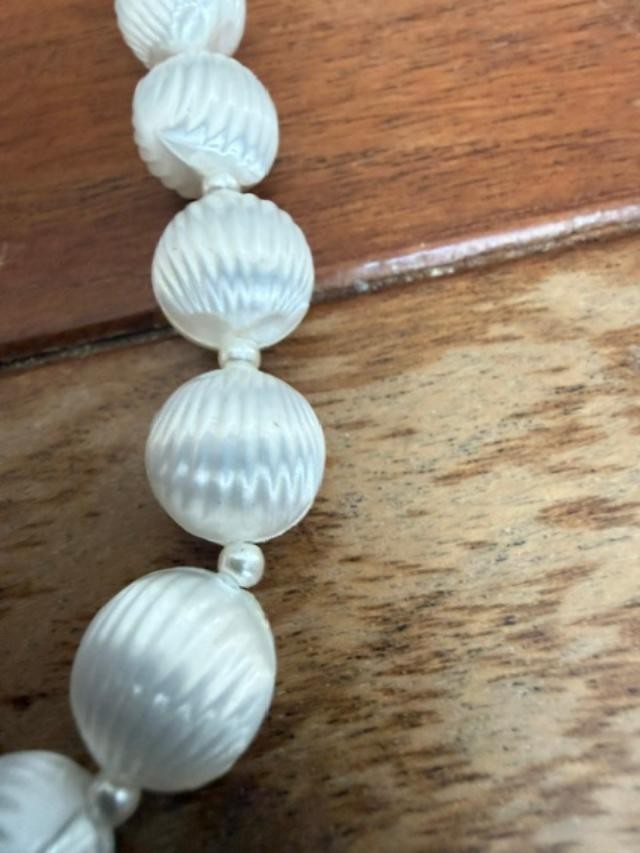vintage long white carved plastic / acrylic bead necklace, approx. 55 inches