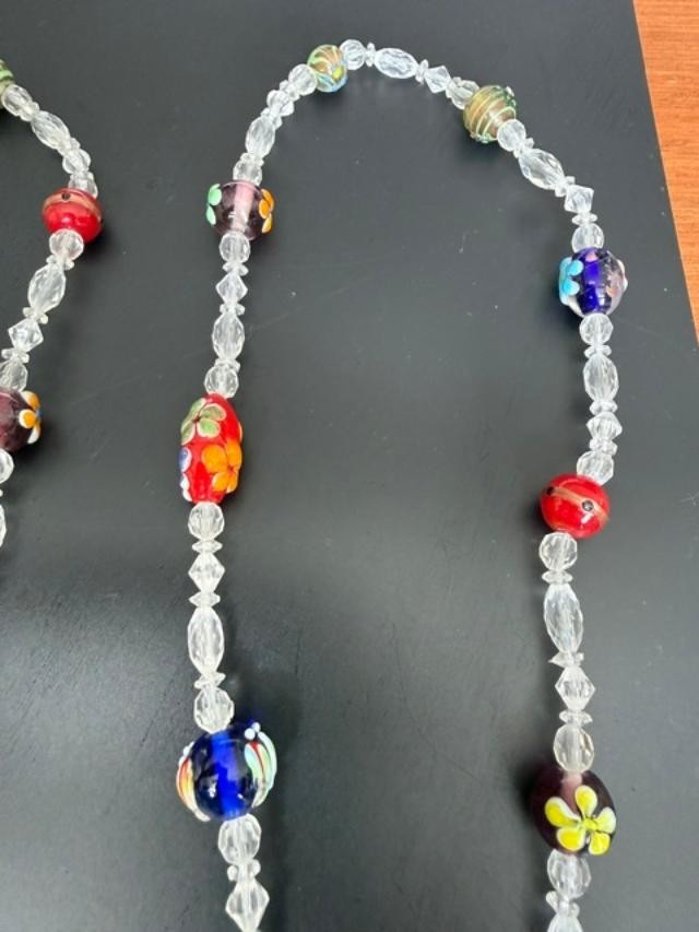 Extra-long multicolor lampwork-style glass bead necklace measuring approximately