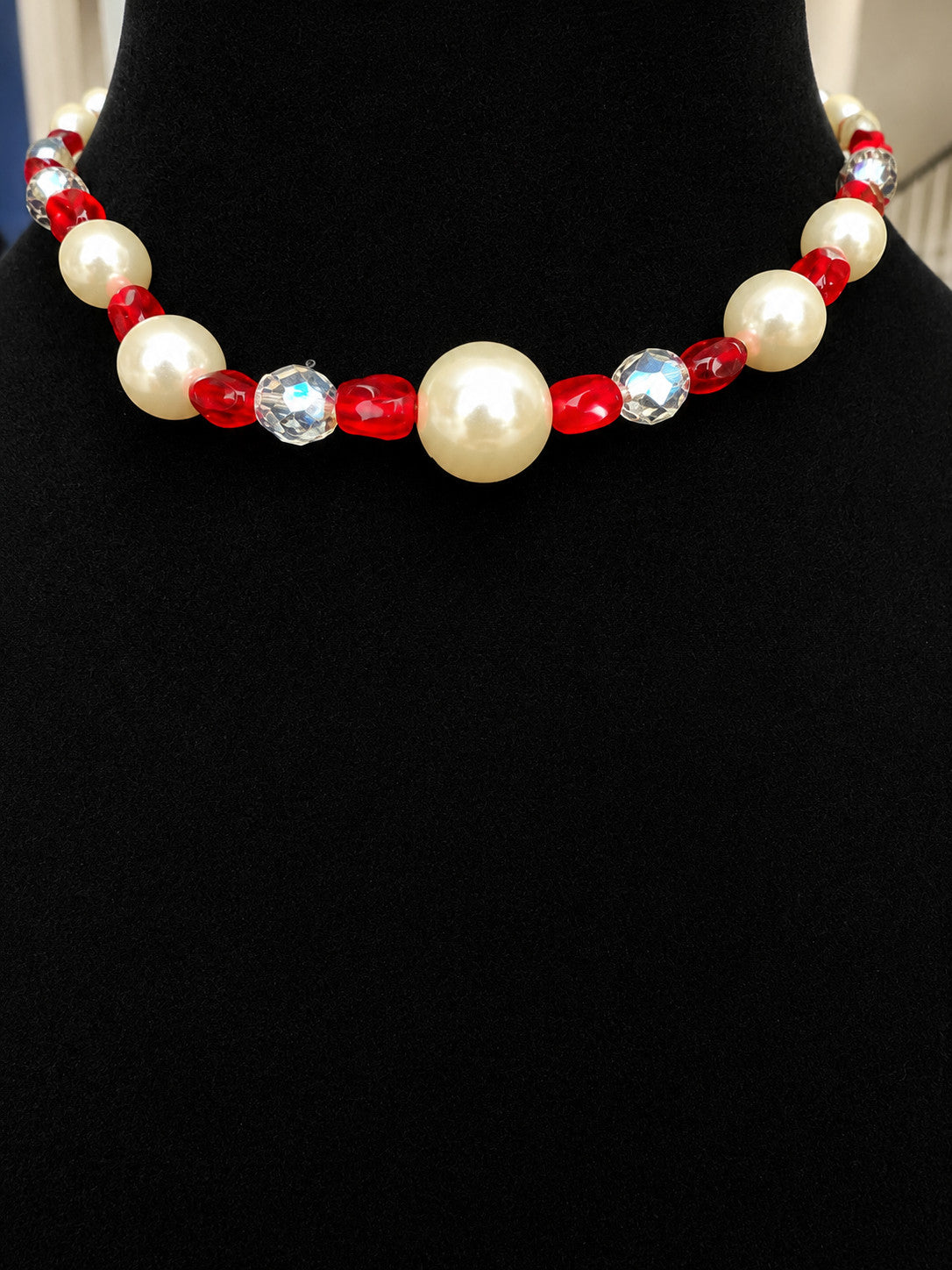 Vintage beaded necklace made with graduated cream faux pearl, red faceted beads