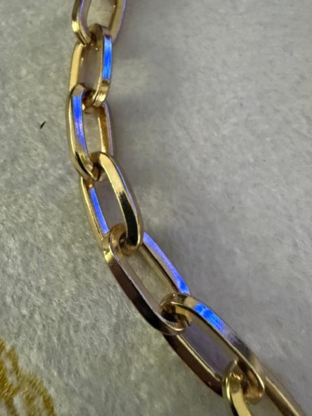 54" unmarked gold-tone heavy paperclip / rectangular link long chain necklace.