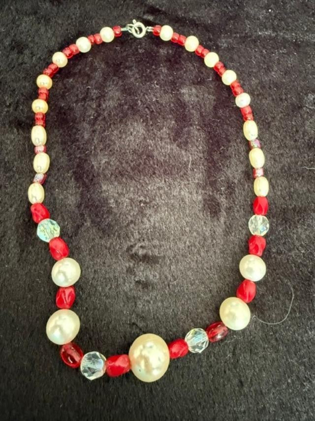Vintage beaded necklace made with graduated cream faux pearl, red faceted beads