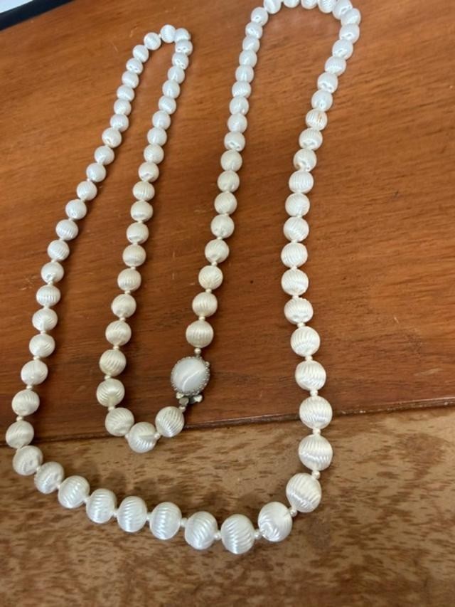 vintage long white carved plastic / acrylic bead necklace, approx. 55 inches