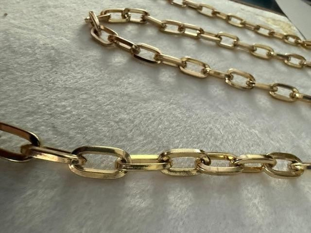 54" unmarked gold-tone heavy paperclip / rectangular link long chain necklace.