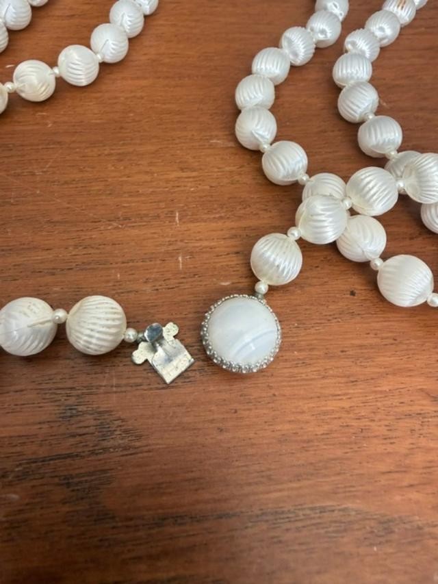 vintage long white carved plastic / acrylic bead necklace, approx. 55 inches