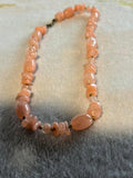Pink Beaded Necklace With Gold Tone Clasp and Spacers