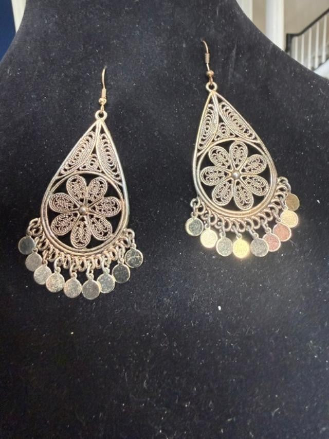 filigree Indian-style dangle earrings featuring an open teardrop frame, detailed