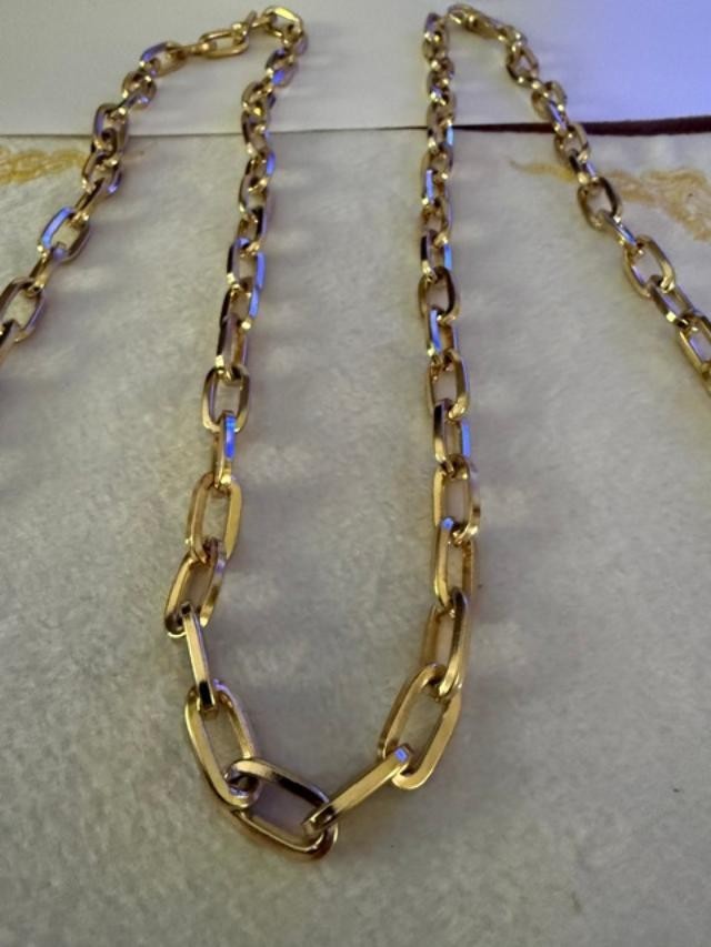 54" unmarked gold-tone heavy paperclip / rectangular link long chain necklace.