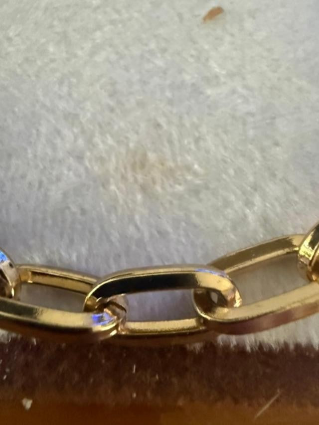 54" unmarked gold-tone heavy paperclip / rectangular link long chain necklace.