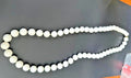 white bead necklace