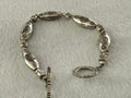 Silver Tone Embossed Floral Oval Bead Toggle Bracelet 7 Inch