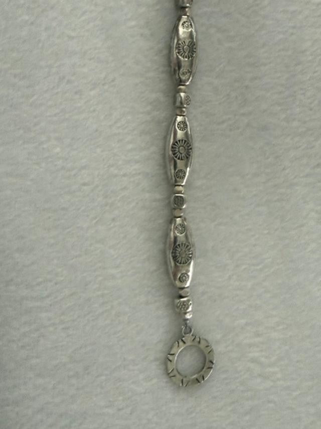 Silver Tone Embossed Floral Oval Bead Toggle Bracelet 7 Inch