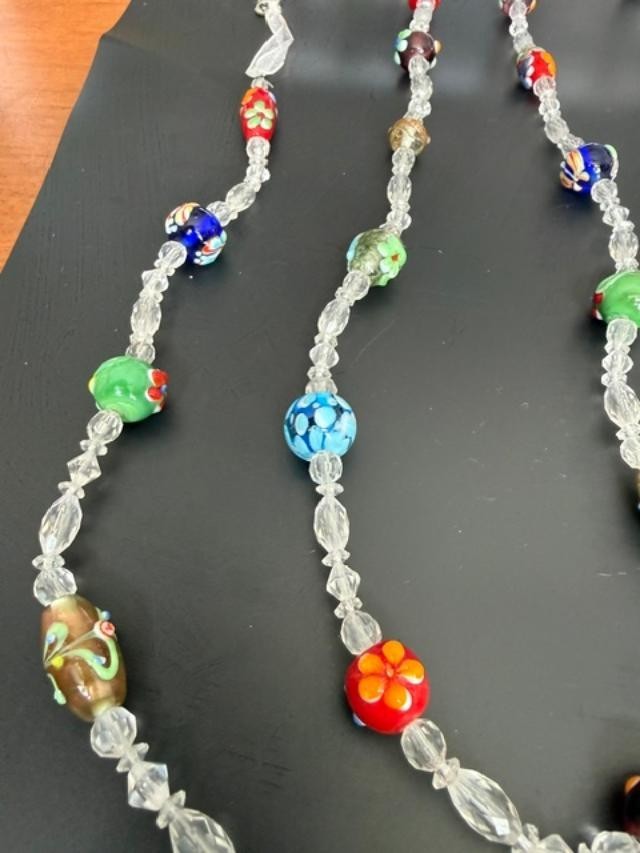 Extra-long multicolor lampwork-style glass bead necklace measuring approximately