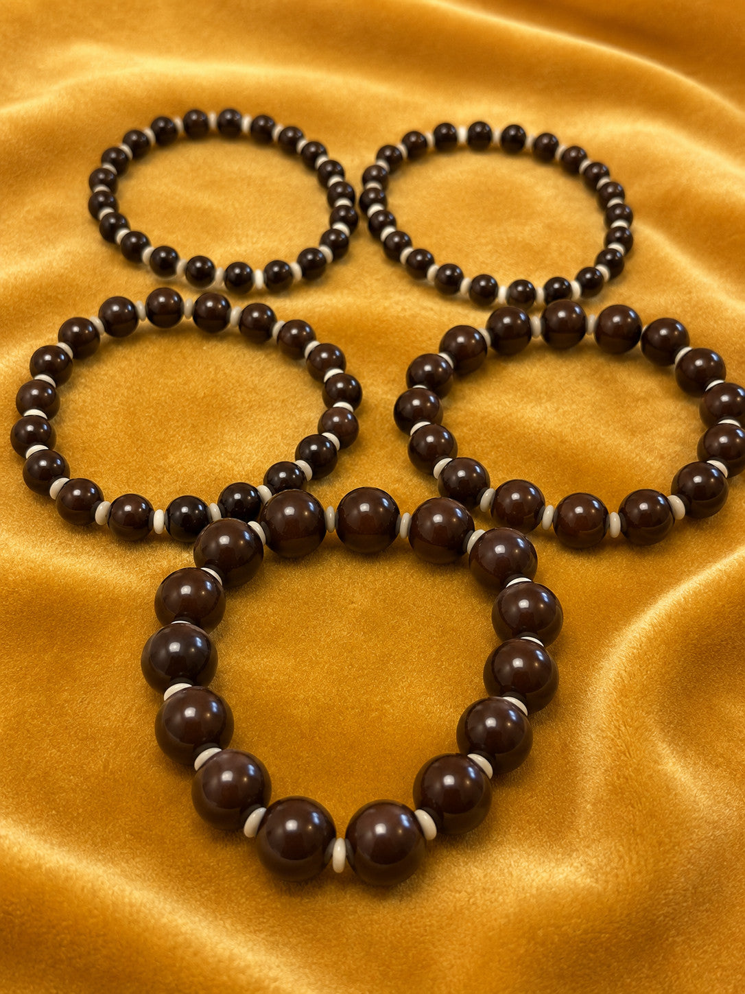 Set of 5 Deep Brown Graduated Bead Stretch Bracelets White Spacers