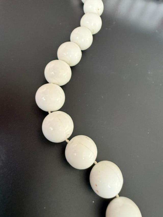 white bead necklace