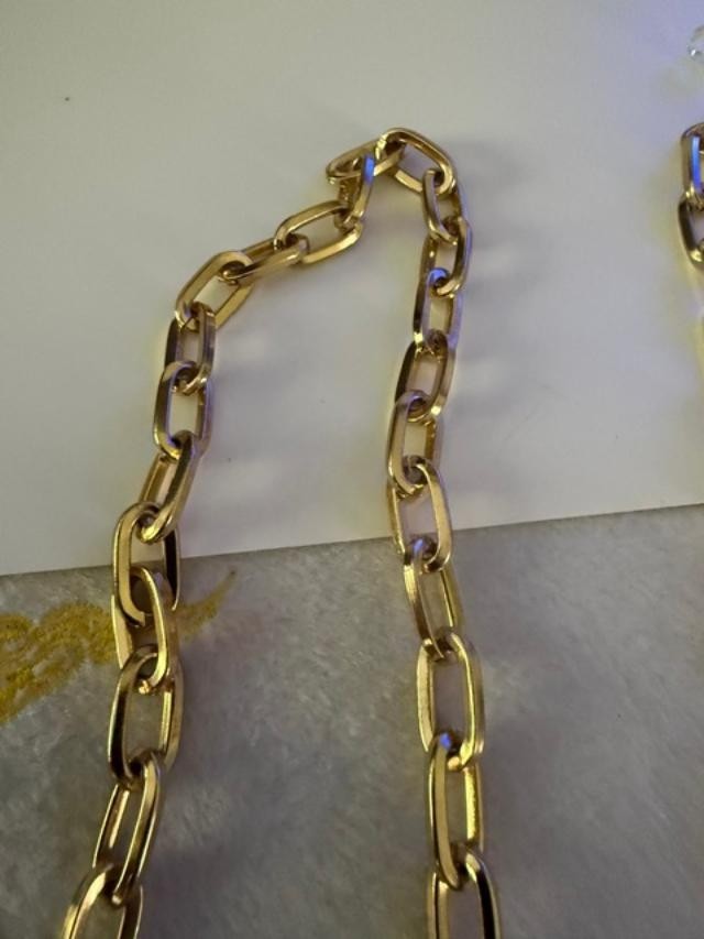 54" unmarked gold-tone heavy paperclip / rectangular link long chain necklace.