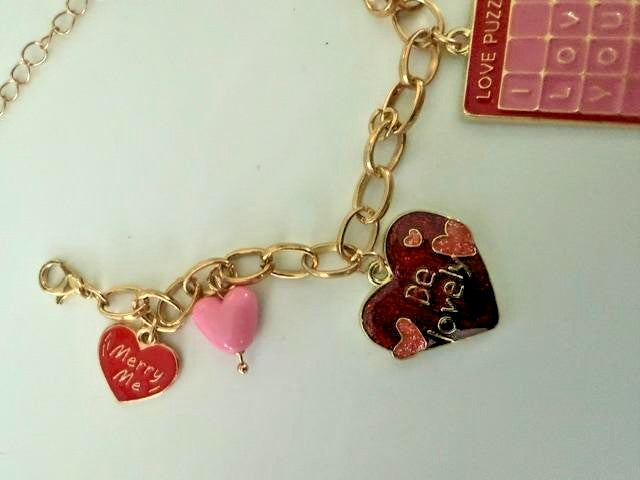 Love Puzzle XOXO Enamel Heart Charm Bracelet Gold Tone