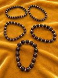 Set of 5 Deep Brown Graduated Bead Stretch Bracelets White Spacers