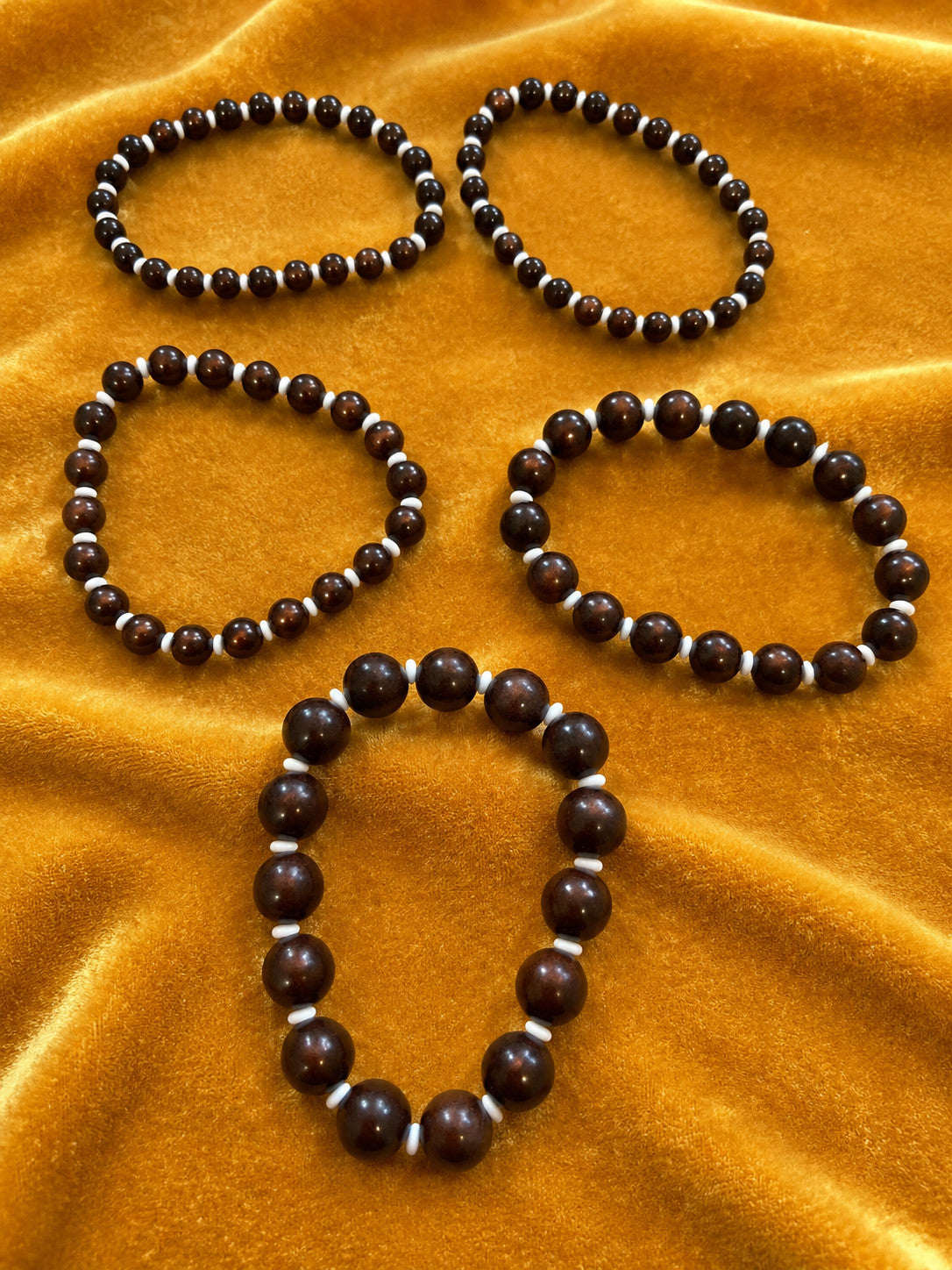 Set of 5 Deep Brown Graduated Bead Stretch Bracelets White Spacers