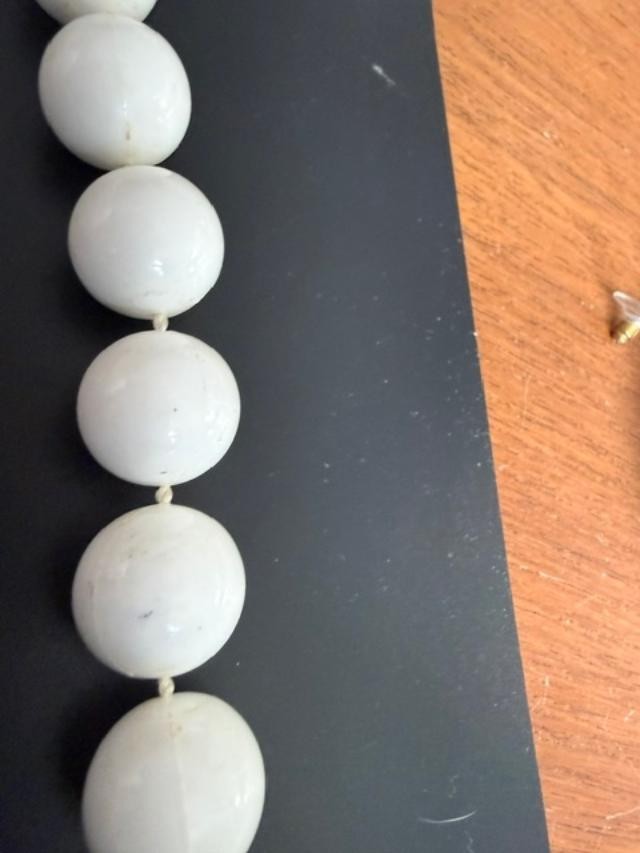 white bead necklace